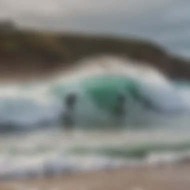 Surfers riding the iconic waves of Fistral Beach