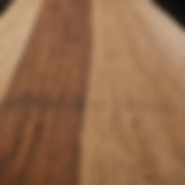 A close-up view of the unique wood grain on an Arbor longboard deck