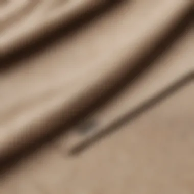 Close-up of fabric texture of beige Nike hoodie