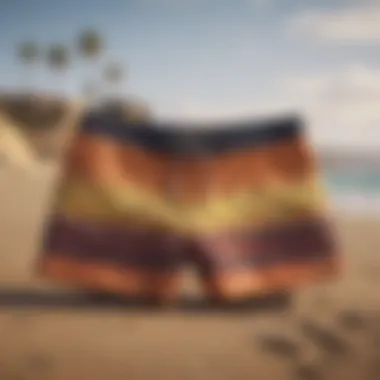 A vibrant collection of beach shorts displayed against a sandy backdrop