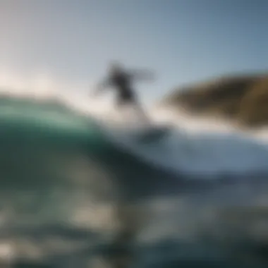 A wake surfer riding the wave created by a boat