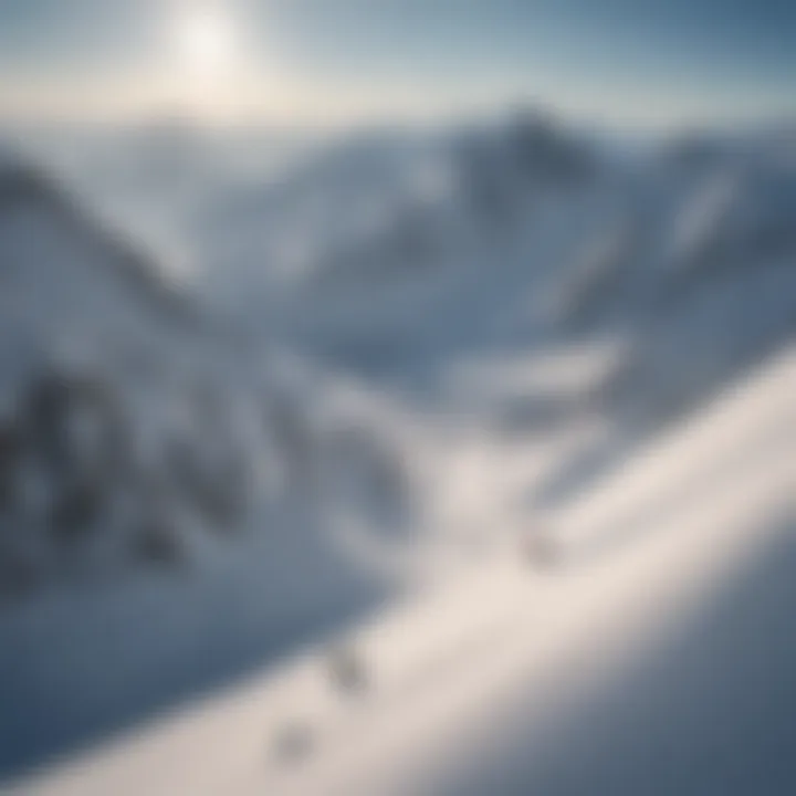 A breathtaking aerial view of a snow-covered mountain landscape with snowboarders descending.