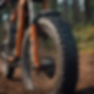 Close-up of enduro bike tires designed for rugged terrain, emphasizing tread patterns