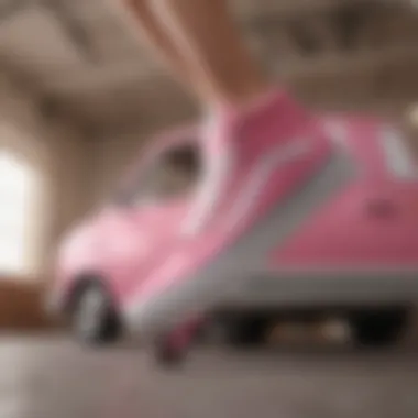 Athlete Performing Tricks in Pink Vans An athlete performing tricks in pink Vans sneakers