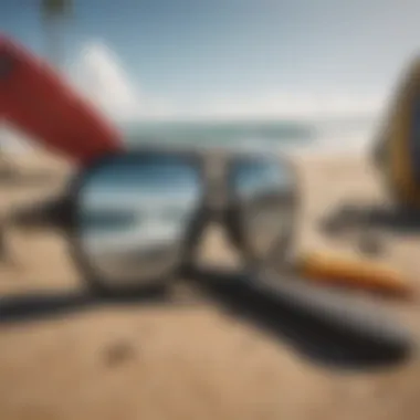 Diverse surf accessories displayed on a beach