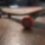 A close-up view of a skateboard deck showcasing intricate design details.