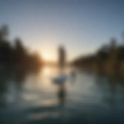 A long paddle board gliding across tranquil waters under a clear blue sky