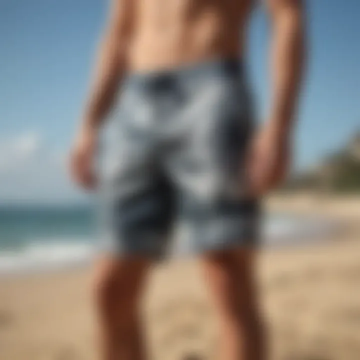 Stylish Quicksliver board shorts displayed against a backdrop of beach scenery