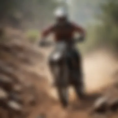 A rider navigating a challenging rocky path on a dirt bike.