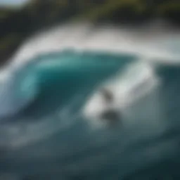 Aerial view of surfers riding waves in the Caribbean