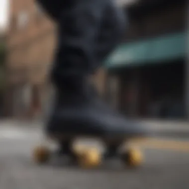 Athlete performing a trick in all black half cab shoes on a skateboard