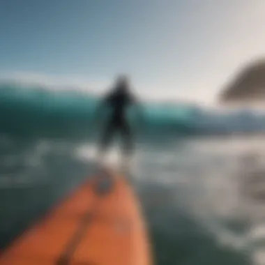 Group of surfers preparing to ride waves from a boat