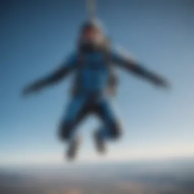 A skydiver free-falling through a clear blue sky.