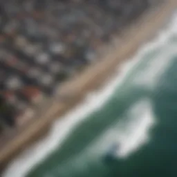 Aerial view of a coastal city showcasing surf spots and urban landscapes