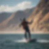 Kiteboarding action over water with a scenic backdrop