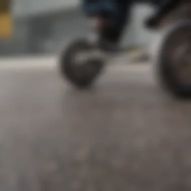 A close-up view of skateboard wheels on a smooth surface, symbolizing speed.