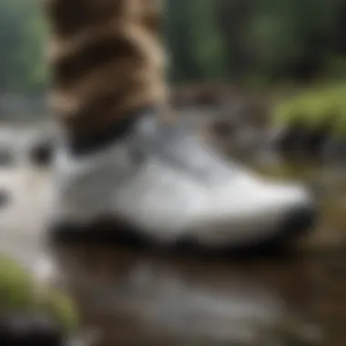 Merrell Hydro Moc White displayed alongside various outdoor adventure gear