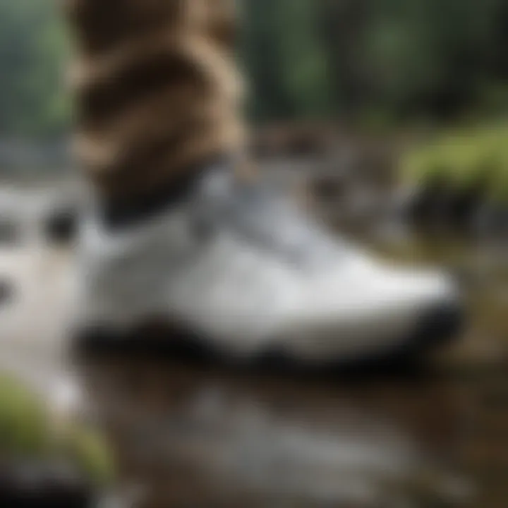 Merrell Hydro Moc White displayed alongside various outdoor adventure gear