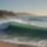 A panoramic view of Santa Cruz coastline with surfers catching waves.