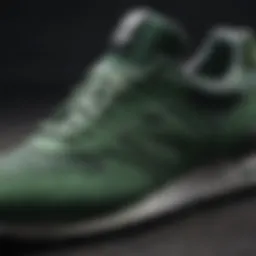 Close-up view of green New Balance sneakers showcasing intricate design details