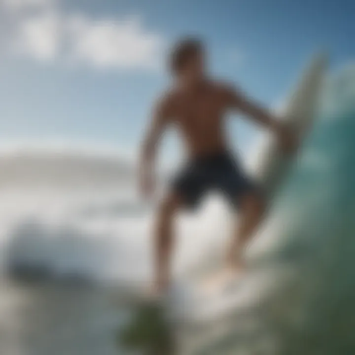 Action shot of surfboarder wearing Hurley shorts in ocean