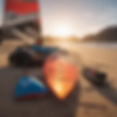 A close-up of essential kite surfing equipment laid out on a beach