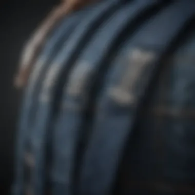 Close-up of straps on fashionable denim