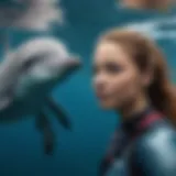 Ocean Ramsey swimming gracefully with a dolphin in clear blue waters