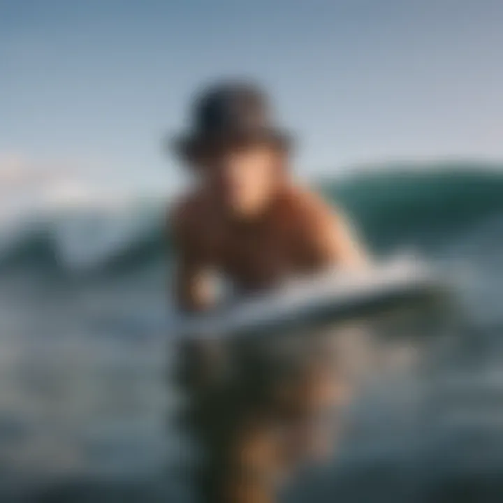 Surfer wearing a Rip Curl surf hat while riding a wave