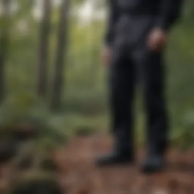 Rothco Black BDU Pants in Action Outdoors Rothco Black BDU Pants showcasing functionality in outdoor settings