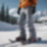 Stylish slim snowboard pants on a snowy slope