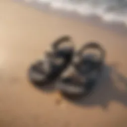 Stylish surf wear sandals on a sandy beach