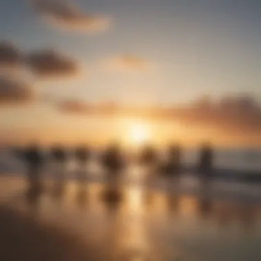 A vibrant sunset casting golden hues over a group of surfers preparing to catch the last waves of the day.