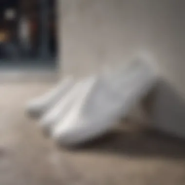 The All-White Vans Slide in Urban Setting Stylish all-white Vans slide on a vibrant urban backdrop