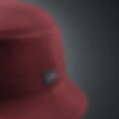 Close-up of the fabric texture of a burgundy bucket hat