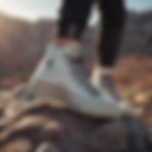 Close-up of Converse Star Hike sneakers on rocky terrain