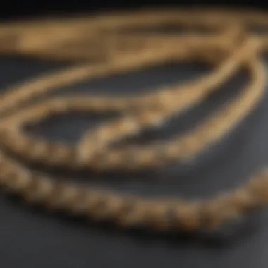 Care and Maintenance for Gold Jewellery Chains A collection of gold jewellery chains and care products on a stylish surface.