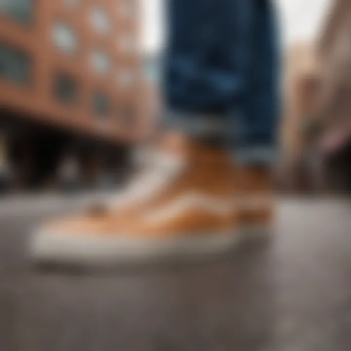 Tan leather Vans paired with trendy streetwear in an urban setting