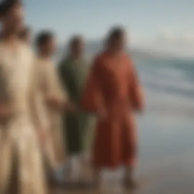 A group of surfers in changing robes on the beach before heading out