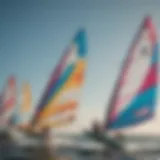 A close-up view of different windsurf sails showcasing their unique designs and colors.
