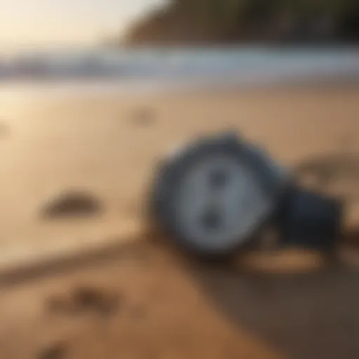 Close-up of a stylish surf watch on a sandy beach