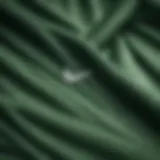 Close-up view of the fabric texture of a green Nike sweatshirt