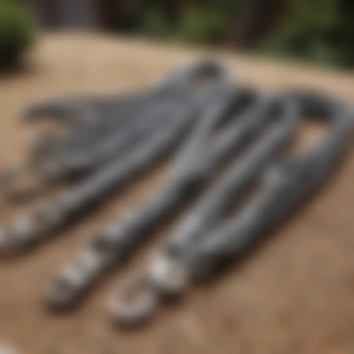 An artistic arrangement of grey lanyards displayed in a creative outdoor setting