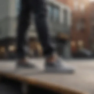 Functionality of Gray Slip-On Vans in Action Gray slip-on Vans on a skateboard, highlighting functionality