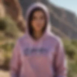 A vibrant Baja hoodie displayed against a coastal backdrop