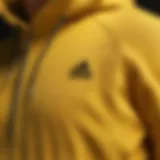 Close-up of the fabric texture of the yellow Adidas hoodie