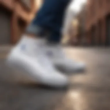 Lifestyle shot of all white high top Chucks in an urban setting